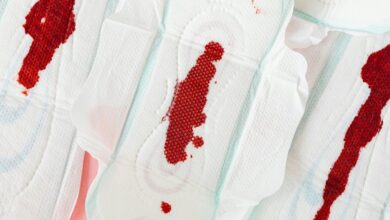 prolonged light flow menstruation symptoms