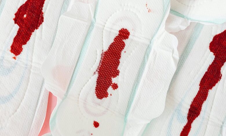 prolonged light flow menstruation symptoms